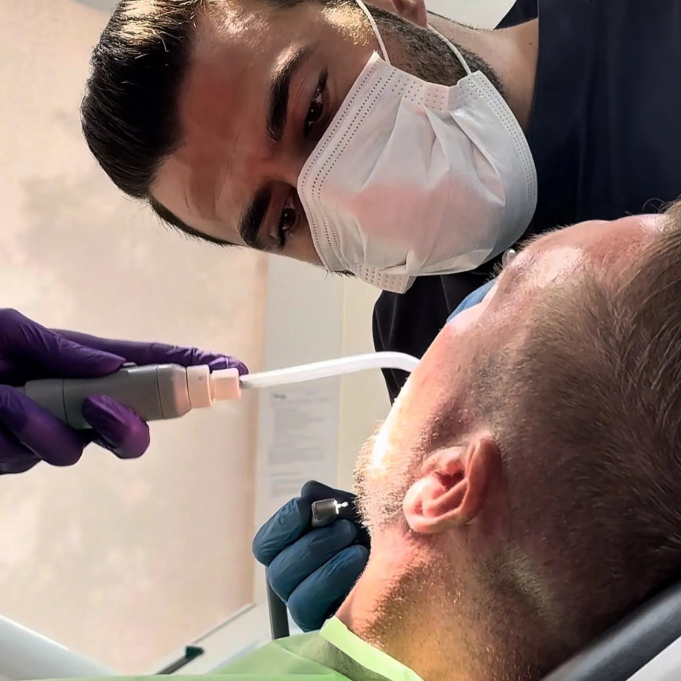 A UK Smiles dentist treating a patient at the clinic in Antalya