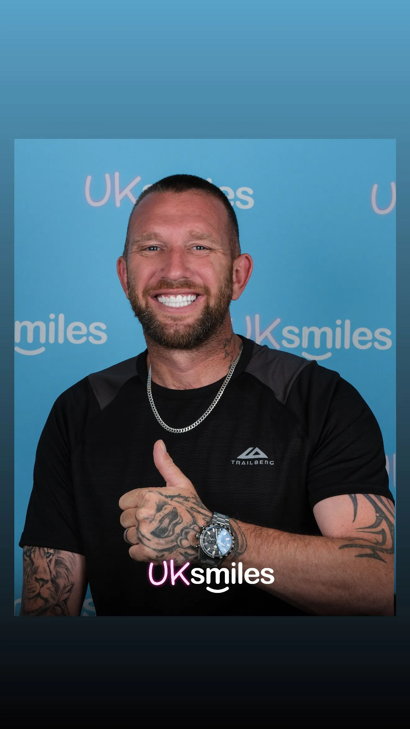 Man giving a thumbs up after his new smile at UK Smiles