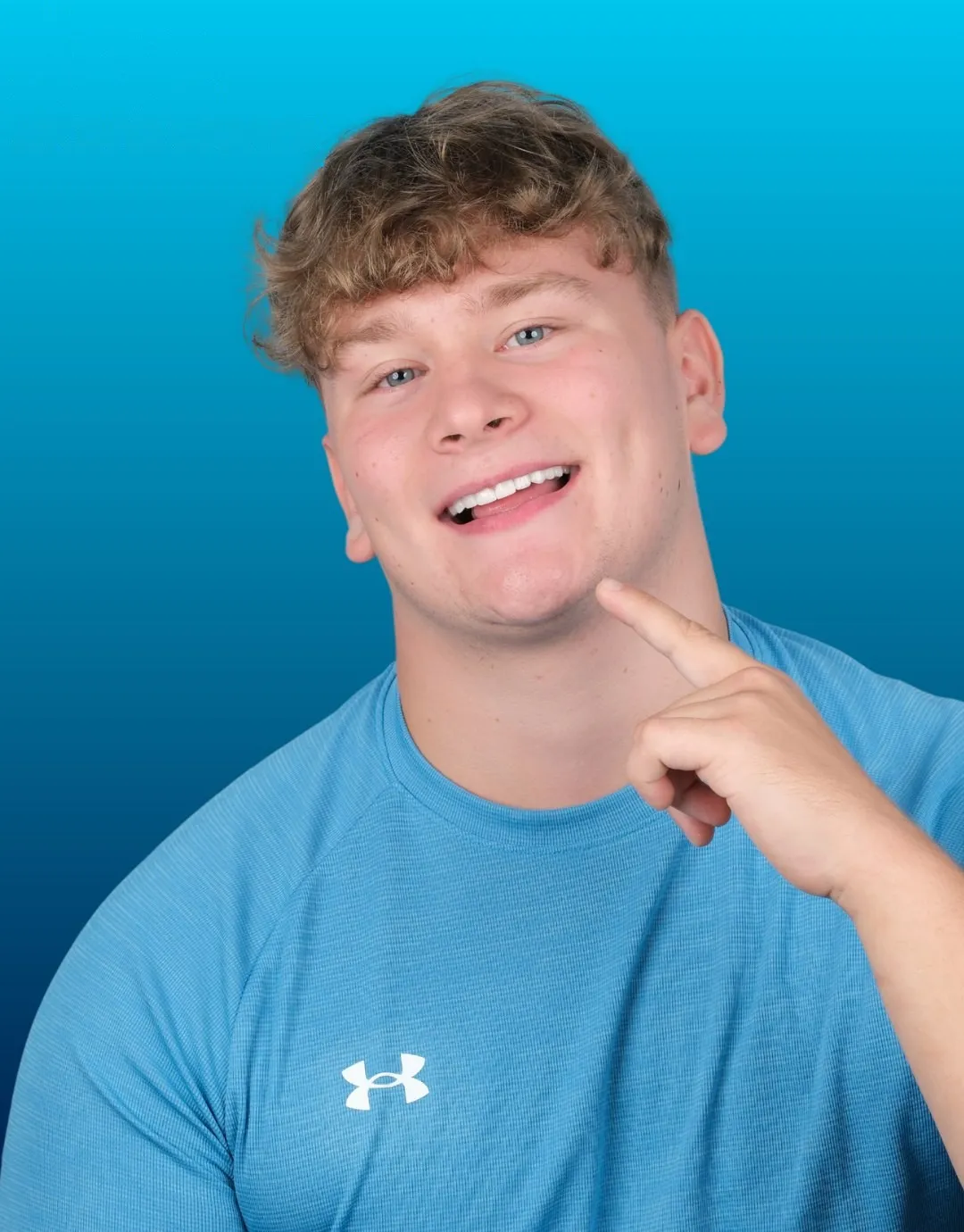 Joe, UK Smiles patient, smiling after Zirconia Crowns