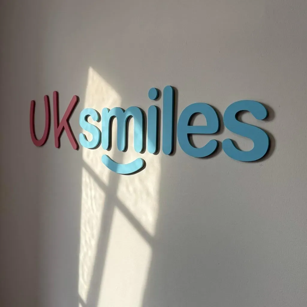 The UK Smiles name on the wall of the Leeds office at Joseph's Well